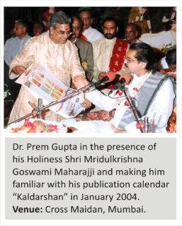 Dr. Prem Gupta in the presence of his Holiness Shri Mridulkrishna Goswami Maharajji and making him familiar with his publication calender Kaldarshan in January