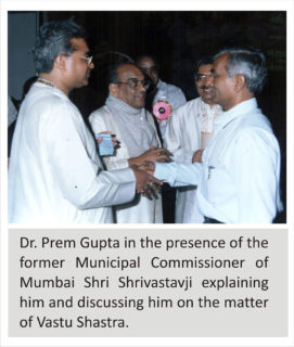 Dr. Prem Gupta in the presence of the former Municipal Commissioner of Mumbai Shri Shrivastavji explaining him and discussing him on the matter of Vastu Shastra